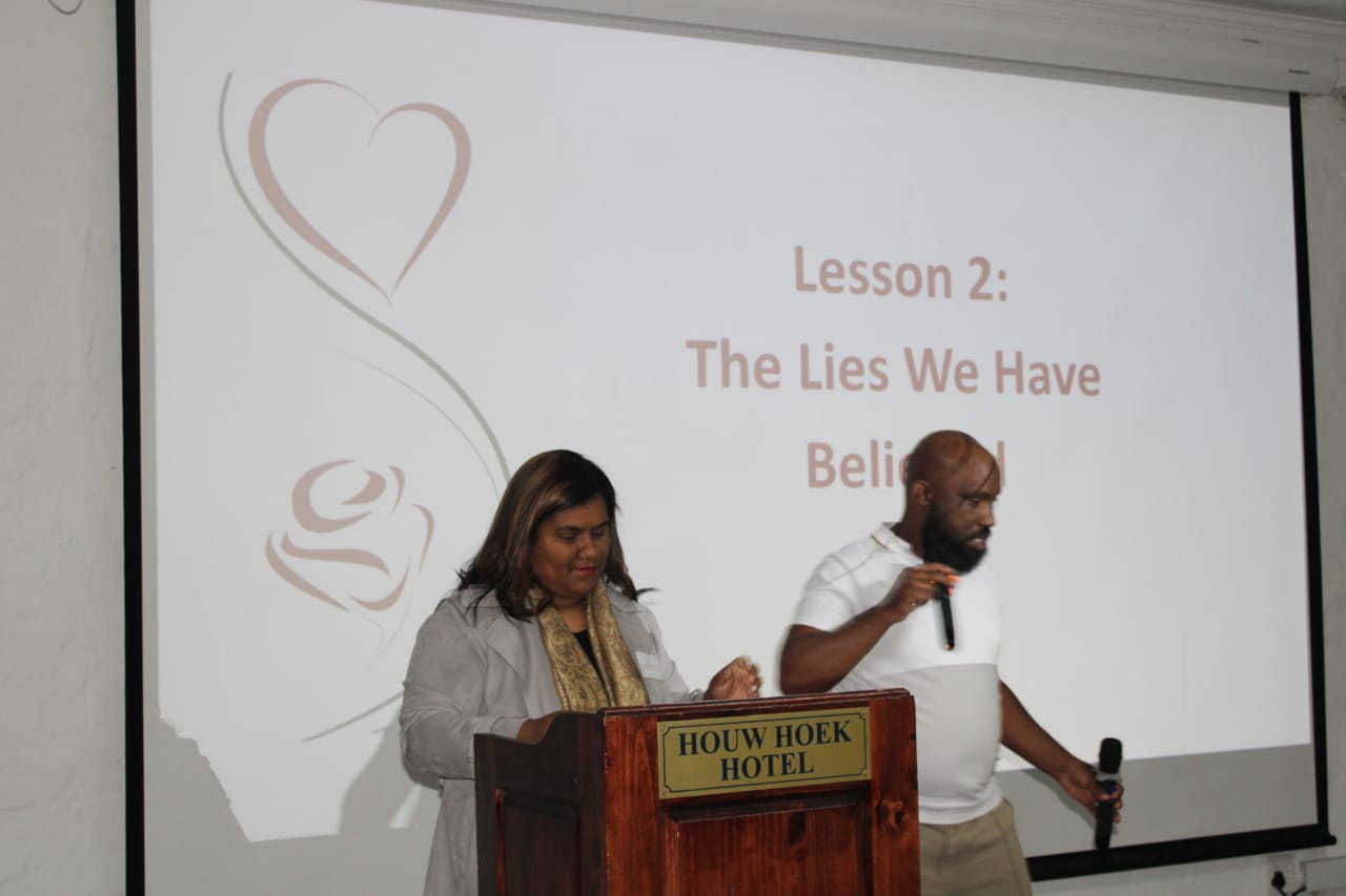Emile and Leticia presenting relationship learning material